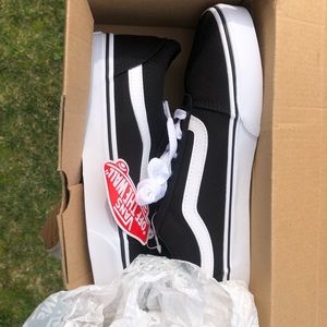 Black/ White Canvas Vans